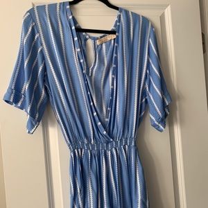 Dolman sleeved romper , deep v front.